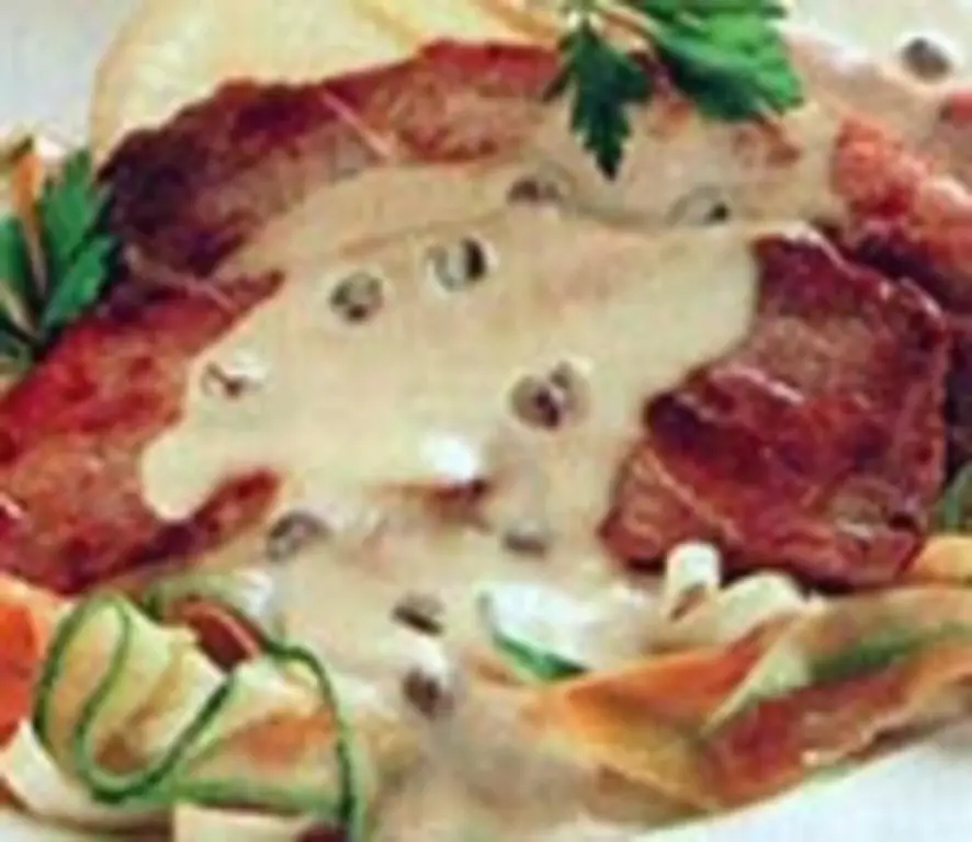 Шницель под соусом из каперсов