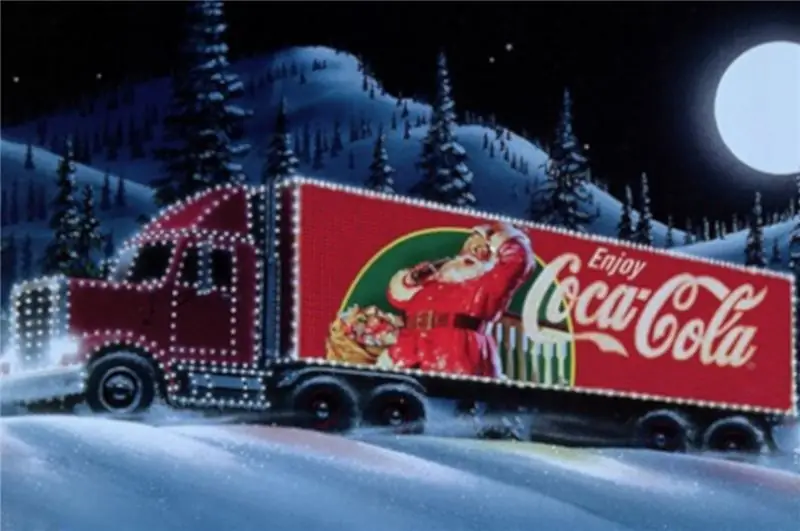 Coca Cola: рождественский грузовик проезжает по Модене, но получает штраф