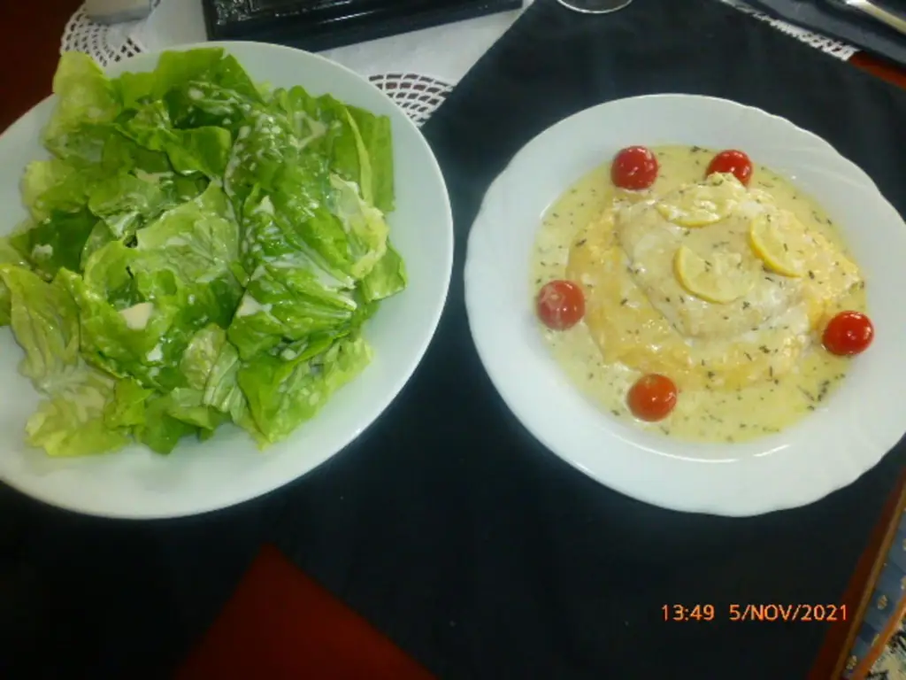 Штайнбиссер в лимонном соусе со сливочной полентой